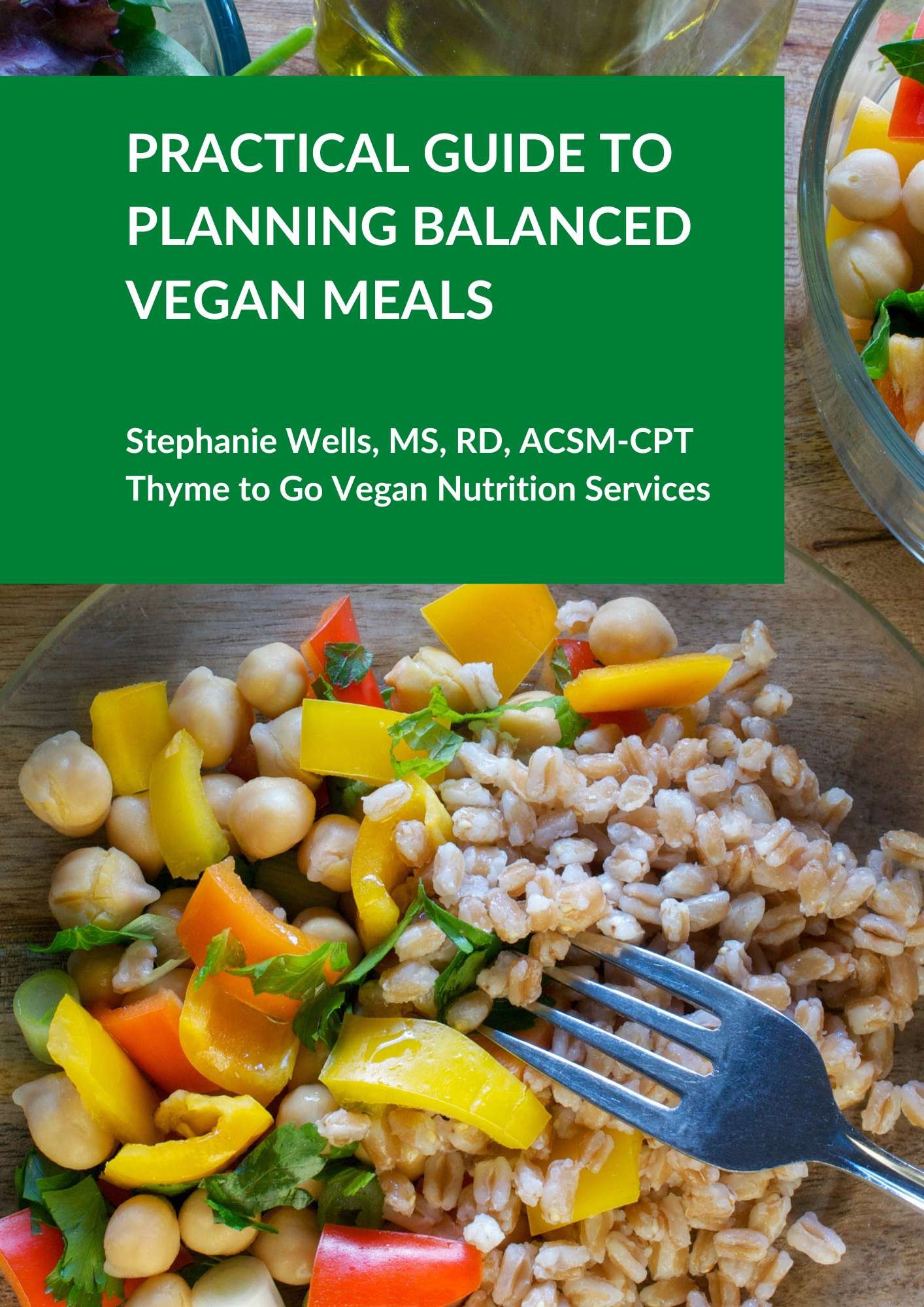 Cover of vegan meal planning guide with a colorful meal of chickpeas, barley, and fresh vegetables