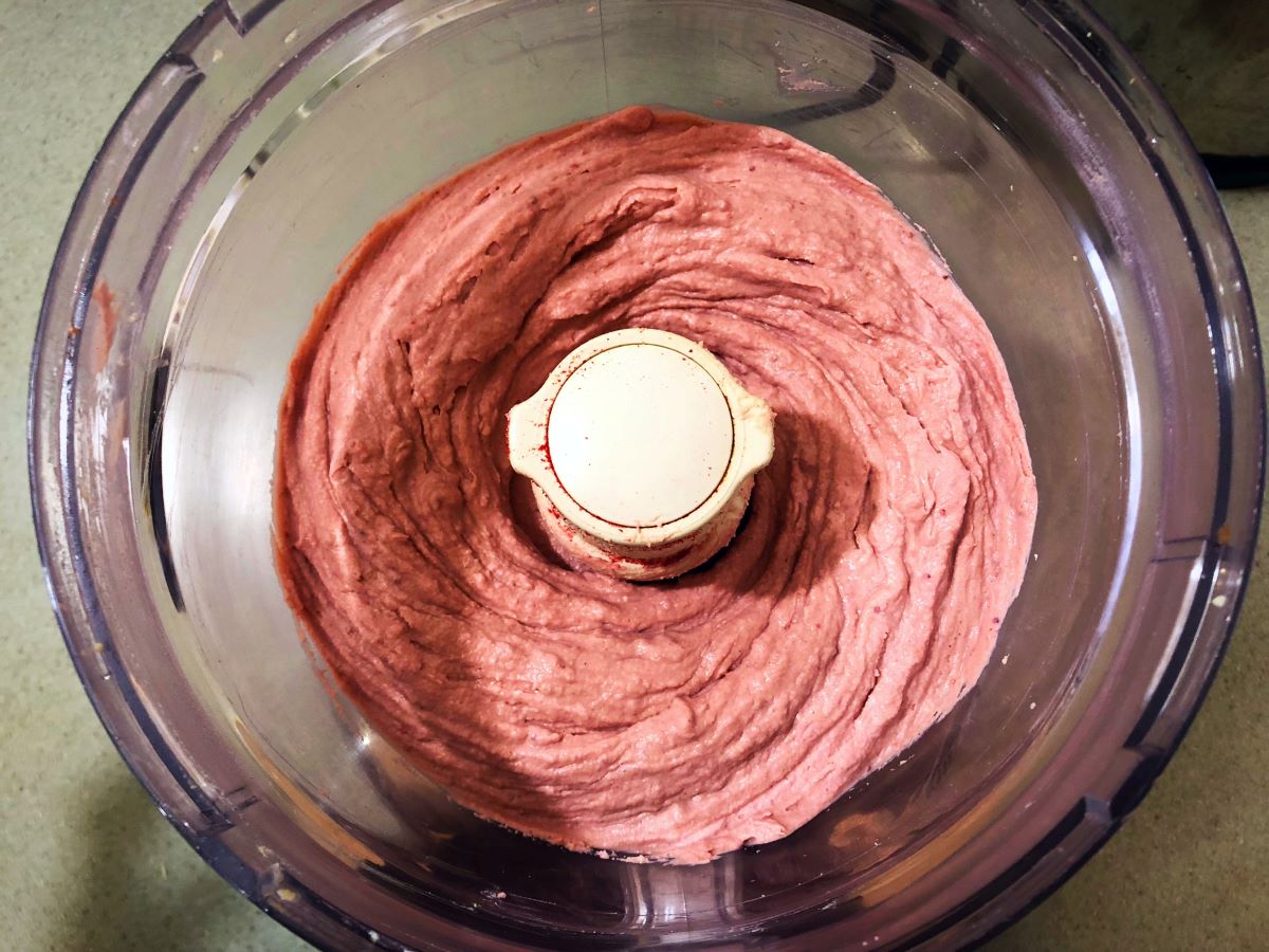 Ingredients being blended in a food processor